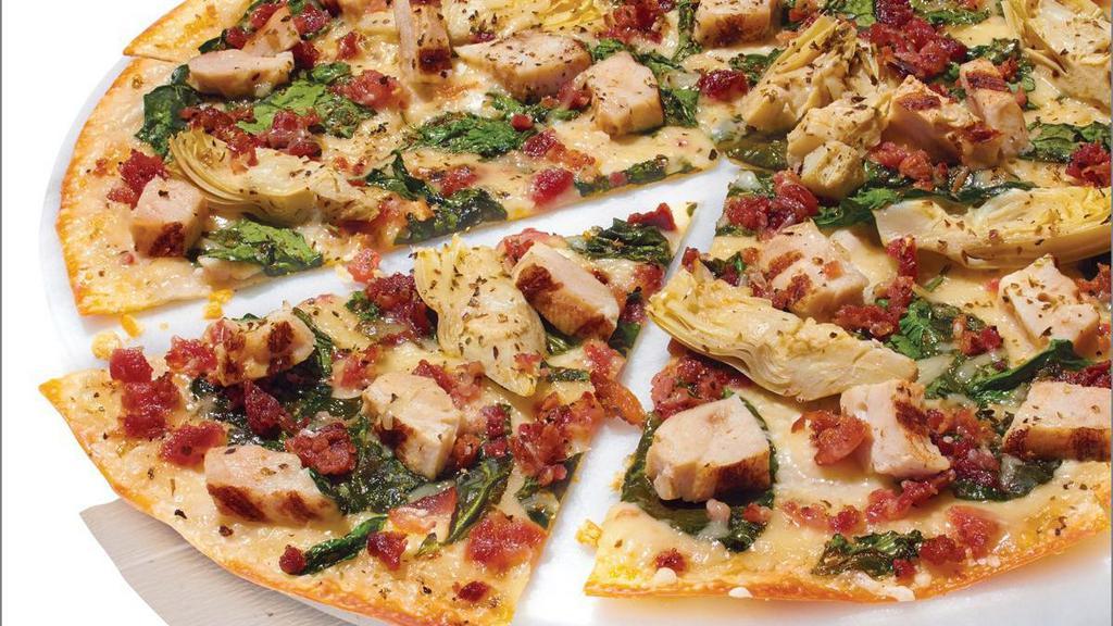 Dairy Free Cheese Chicken Bacon Artichoke - Baking Required · Our Artisan Thin Crust, topped with Creamy Garlic Sauce, Dairy Free Mozzarella, Grilled Chicken Raised Without Antibiotics, Crispy Bacon, Marinated Artichoke Hearts, Fresh Spinach, Zesty Herbs. *Sauce contains dairy. Substitute Traditional Red Sauce or Olive Oil & Garlic for a dairy-free pizza. Currently, some of our Papa Murphy’s stores are experiencing periodic outages of Bacon. We apologize for any inconvenience.