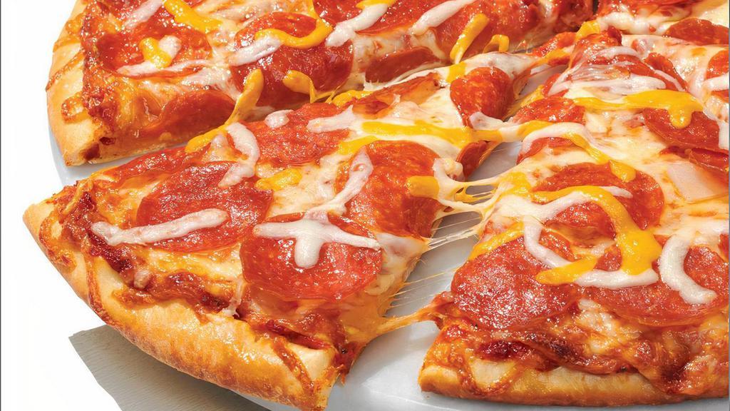Pepperoni - Baking Required · Our Original Crust topped with Traditional Red Sauce, Whole-Milk Mozzarella, Mild Cheddar, and Premium Pepperoni