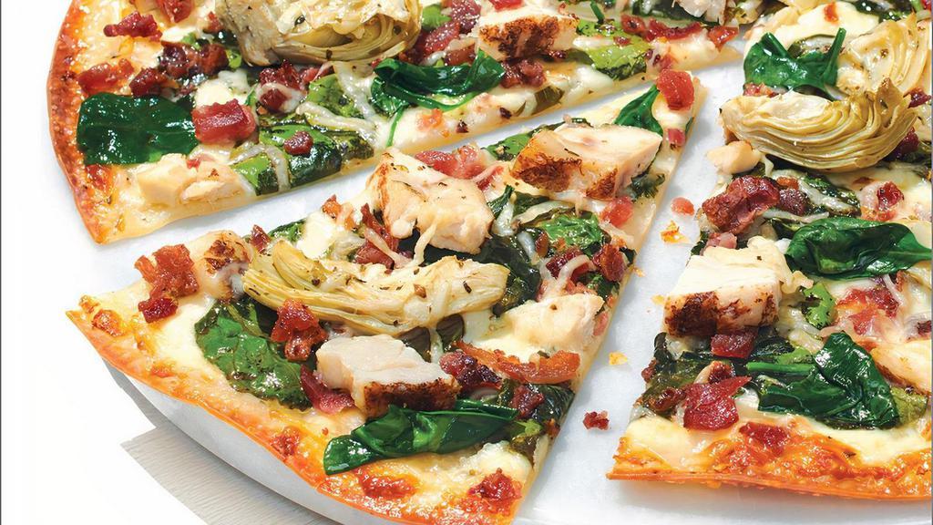 Chicken Bacon Artichoke - Baking Required · Our Artisan Thin Crust, topped with Creamy Garlic Sauce, Whole-Milk Mozzarella, Grilled Chicken Raised Without Antibiotics, Crispy Bacon, Marinated Artichoke Hearts, Fresh Spinach, Aged Parmesan and Zesty Herbs. Currently, some of our Papa Murphy’s stores are experiencing periodic outages of Bacon. We apologize for any inconvenience.