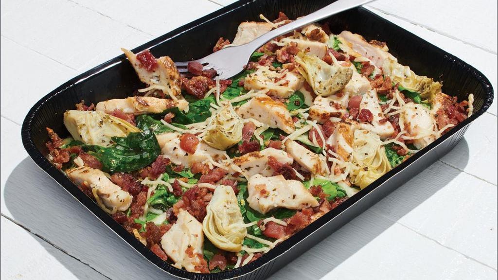 Chicken Bacon Artichoke (Keto Friendly) - Baking Required · Creamy Garlic Sauce, Whole-Milk Mozzarella, Grilled Chicken Raised Without Antibiotics, Crispy Bacon, Marinated Artichoke Hearts, Fresh Spinach, Aged Parmesan and Zesty Herbs without the Crust. This recipe is Keto-friendly, but still fully customizable. Macros for this entire tray with the default build are Fats: 89g, Proteins: 91g, Carbs: 21g. For more product information and our nutritional calculator please visit Papamurphys.com/nutrition.. Currently, some of our Papa Murphy’s stores are experiencing periodic outages of Bacon. We apologize for any inconvenience.