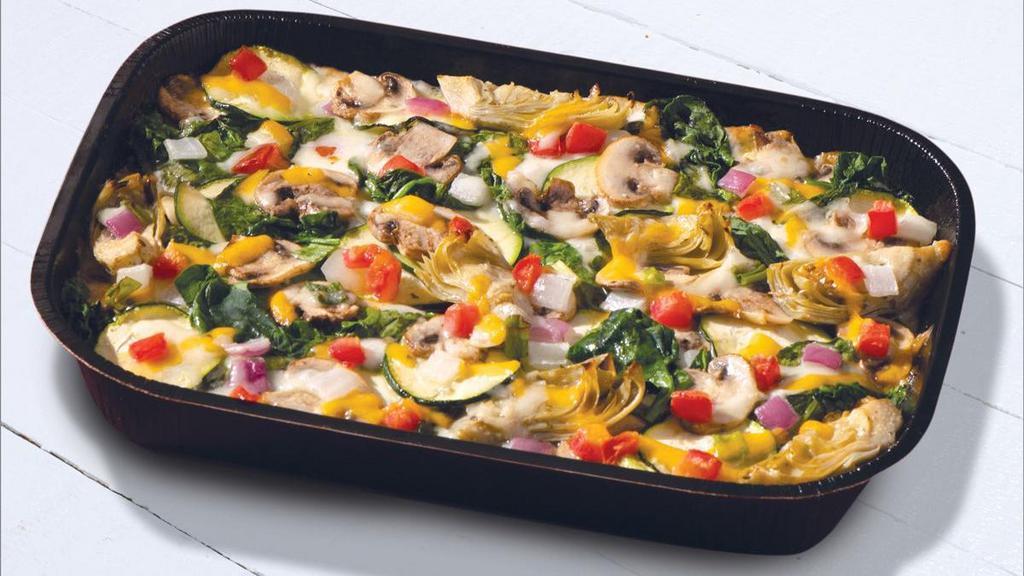 Gourmet Vegetarian (Keto Friendly) - Baking Required · Creamy Garlic Sauce, Whole-Milk Mozzarella, Fresh Spinach, Sliced Zucchini, Sliced Mushrooms, Marinated Artichoke Hearts, Roma Tomatoes, Mixed Onions, Cheddar, and Herb & Cheese Blend. This recipe is Keto-friendly, but still fully customizable. Macros for this entire tray with the default build are Fats: 79g, Proteins: 57g, Carbs: 23g. For more product information and our nutritional calculator please visit Papamurphys.com/nutrition.