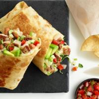 Chicken Avocado Burrito · Satisfy your craving for something delicious with fire-grilled chicken, fresh avocado, pinto...