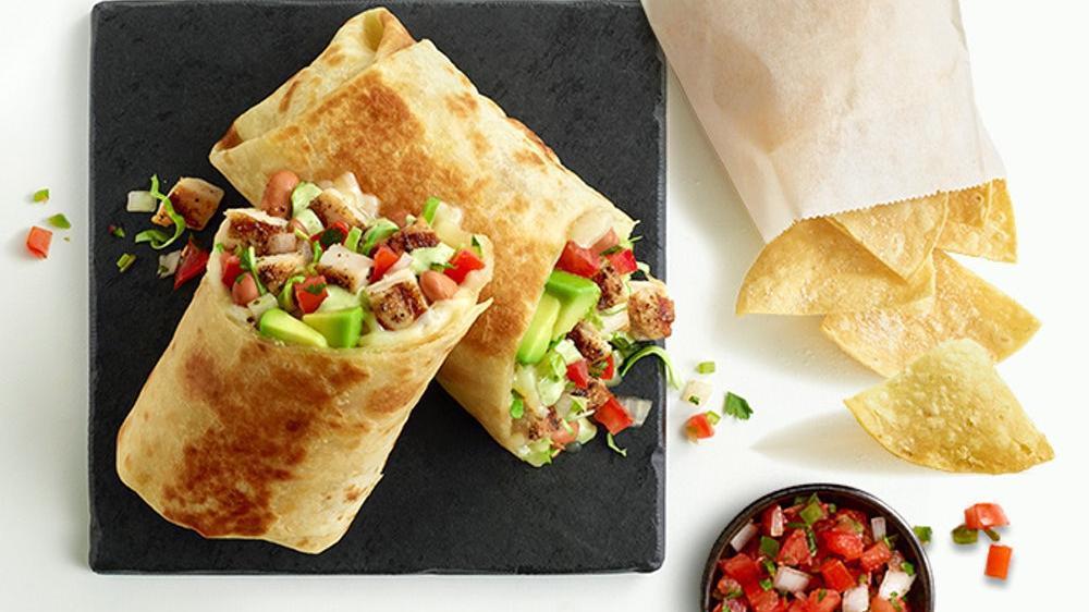 Chicken Avocado Burrito · Satisfy your craving for something delicious with fire-grilled chicken, fresh avocado, pinto beans, pico de gallo salsa, jack cheese, cabbage, fresh cilantro, and creamy cilantro dressing wrapped in a grilled tortilla. . Includes chips and salsa.