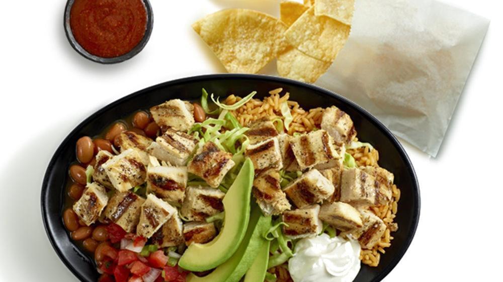 Double Chicken Bowl · Double up on a double portion of delicious citrus-marinated chopped chicken on top of authentic pinto beans, rice, cabbage and garnished with sour cream, shredded jack cheese, avocado slices and pico de gallo salsa.. Includes chips and salsa.