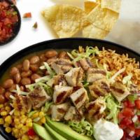Grande Avocado Chicken Bowl · Ripe avocados with citrus-marinated, fire-grilled chopped chicken, cool sour cream, sweet co...
