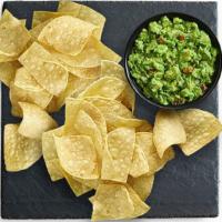 Chips & Guacamole Large · White corn tortilla chips, hand salted and made fresh daily. Served with freshly, hand-made ...