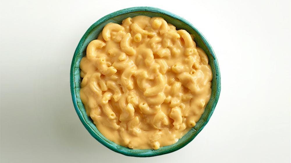 Macaroni & Cheese · Elbow macaroni immersed in a creamy, cheese sauce.