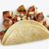 Chicken Taco Al Carbon · Chopped citrus-marinated fire-grilled thigh meat, diced onion, and cilantro with two corn to...