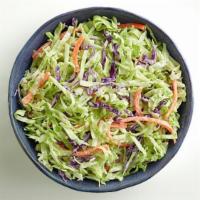 Coleslaw  · Shredded green and red cabbage and shredded carrots combined with a creamy sweet and sour dr...