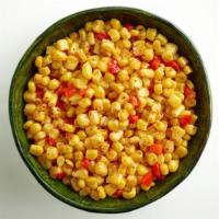 Corn · Cut corn mixed with diced red peppers, lightly coated in a delicate buttery sauce.