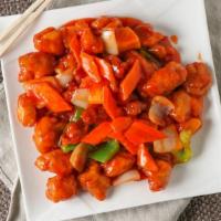 Sweet & Sour Chicken · Chicken breast fried to golden brown, toss-cooked with bell peppers, onions, carrots, and pi...