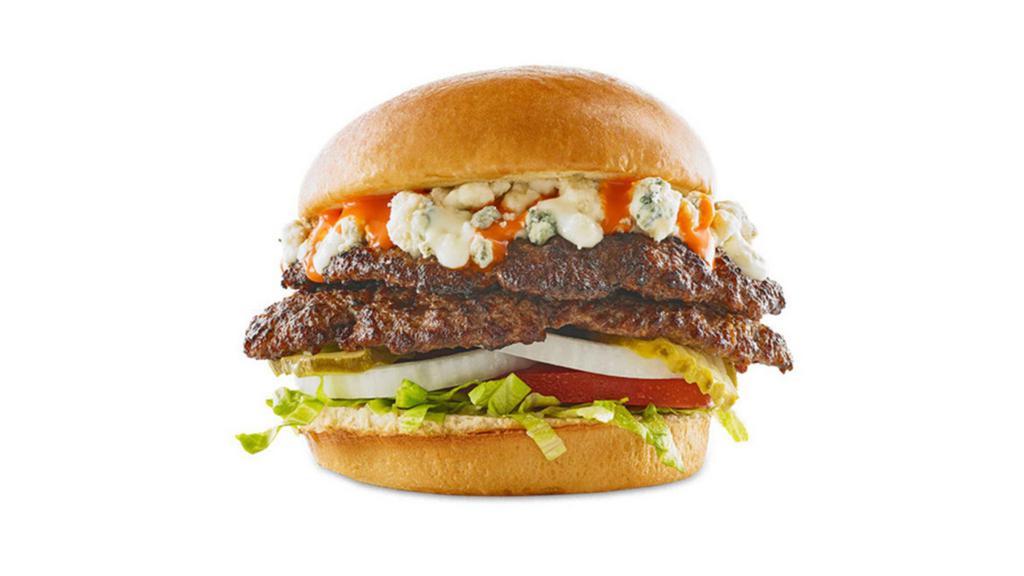 Buffalo Bleu Burger · DOUBLE PATTY / HAND-SMASHED / BLEU CHEESE CRUMBLES / MEDIUM BUFFALO SAUCE / SHREDDED ICEBERG / TOMATO / ONION / PICKLES / BLEU CHEESE DRESSING / CHALLAH BUN