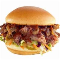 Smoked Brisket Sandwich · SMOKED PULLED BRISKET / SWEET BBQ / GRILLED ONIONS / SLAW / PICKLES / CHALLAH BUN / NATURAL-...