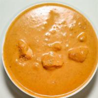 Chicken Tikka Masala · Tandoori baked chicken breast cooked in a smooth nutty curry with a touch of saffron with on...
