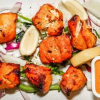Chicken Tikka · Tender and juicy ginger and garlic flavored chicken breast cubes marinated overnight in vine...