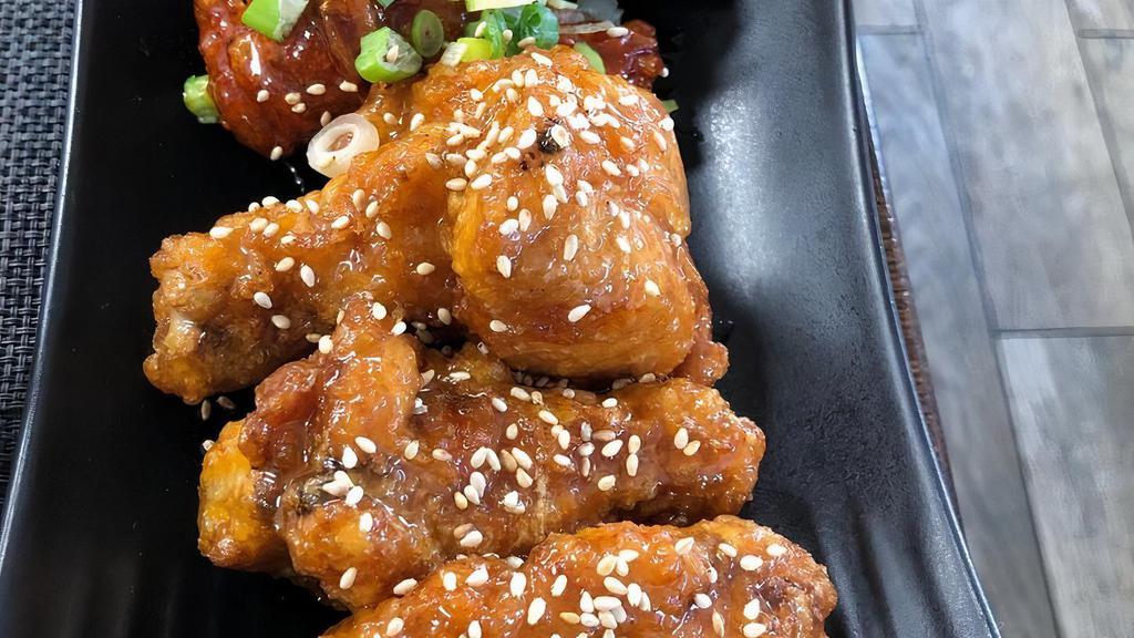 Ninja Chicken Wings · Deep fried chicken wings with garlic soy sauce.