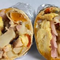 Breakfast Burrito - Carne · served w side of jalapeno salsa roja & fresh crema
choice of smoked ham & bacon or Beyond pl...