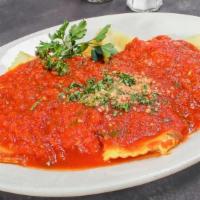 CHEESE OR MEAT RAVIOLI · Cheese or Meat stuffed pasta, choice of Marinara, Bolognese or Pomodoro Alfredo Sauce - Pest...