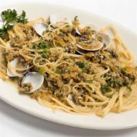 LINGUINI WITH CLAMS PASTA · Tender clams simmered in their natural juices with garlic & herbs served over linguini