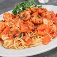 SHRIMP CAPPELLINI POMODORI PASTA · Shrimp, Fresh tomatoes, garlic & basil, cappellini
