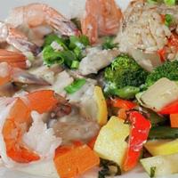 SCAMPI GRIGLIA ENTREE · Jumbo prawns, sautéed garlic, shallots, fresh herbs, green onion, mushrooms, white wine crea...