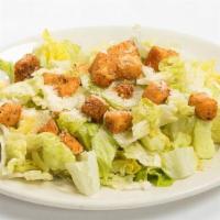 CAESAR SALAD · Traditional dressing tossed with romaine