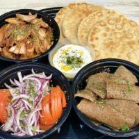 Gyro Kit for 4 · Served with four Pita Breads, Side of Tzatziki, Tomato & Onion,  and your choice of Gyro mea...