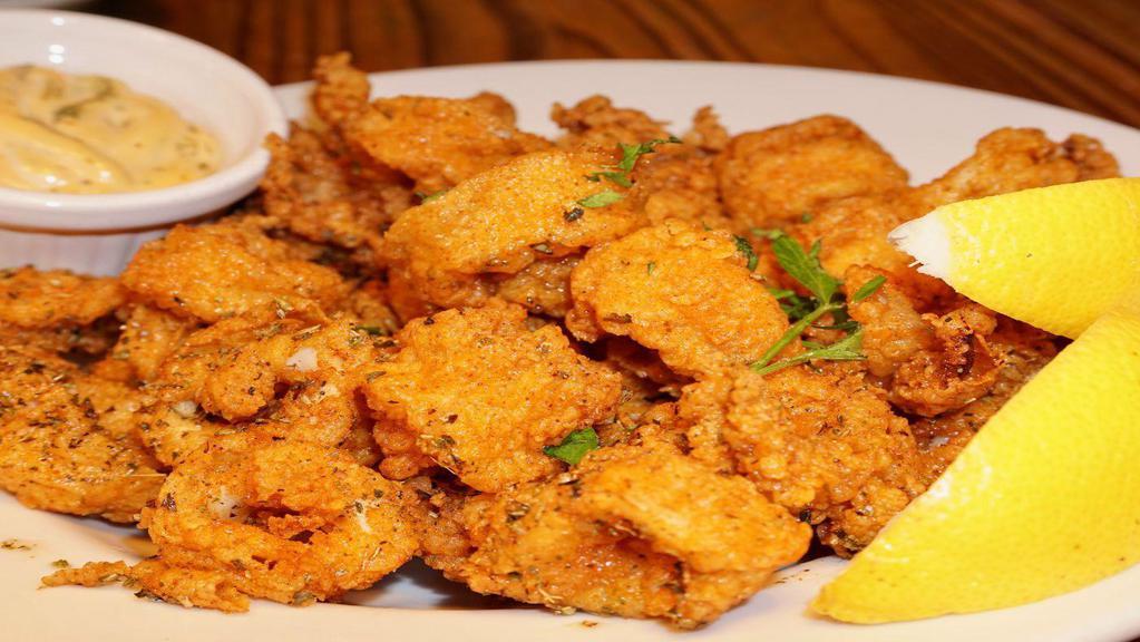Fried Calamari · Calamari seasoned with herbs and spices, lightly floured and flash fried; served with house aioli.