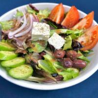 House Salad · Mixed greens, tomatoes, cucumbers, feta, red onions and Kalamata olives tossed in balsamic v...