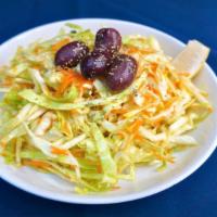 Lahanosalata (Cabbage Salad) · Finely shredded cabbage and carrots tossed with vinegar, sea salt and extra virgin olive oil.