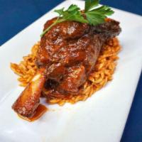Lamb Shanks with Orzo (Giouvetsi Me Arni) · Lamb shanks braised then slow baked with Greek orzo and red sauce, and sprinkled with parmes...