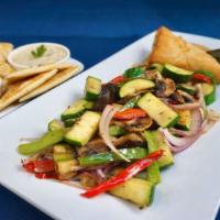 Aegean Veggie Combo · Sauteed zucchini, eggplant, mushrooms & bell peppers; dolmades; spanakopita; baba ganoush an...