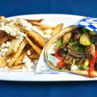 Veggie Pita · Grilled zucchini, peppers, red onions and mushrooms served on pita with tomatoes & tzatziki.