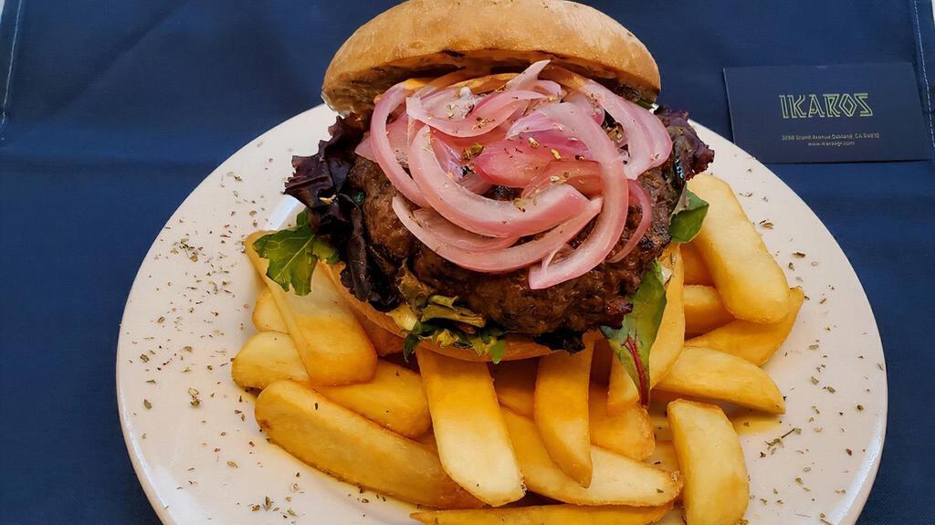 Juicy 1/3 lb Lamb-burger · Seasoned freshly ground lamb served on a toasted bun with tomatoes, picked onions, spring mix & our house garlic-dill aioli.