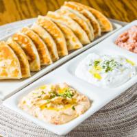 Dip & Spread Platter · Your choice of any 3 dips. Served with three pieces of pita bread.