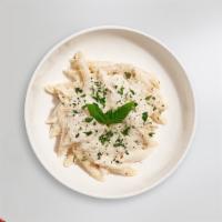 Cluck Chuck Rotini Alfredo · Fresh rotini with classic alfredo sauce based pasta cooked with grilled chicken and pesto. (...