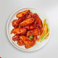 Buffed Buffalo Wings  · Fresh chicken wings breaded, fried until golden brown, and tossed in buffalo sauce. Served w...