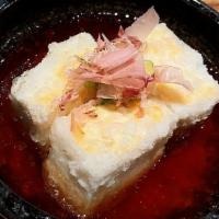 Agedashi Tofu · (Deep fried tofu with broth, topped with bonito flakes, green onion).