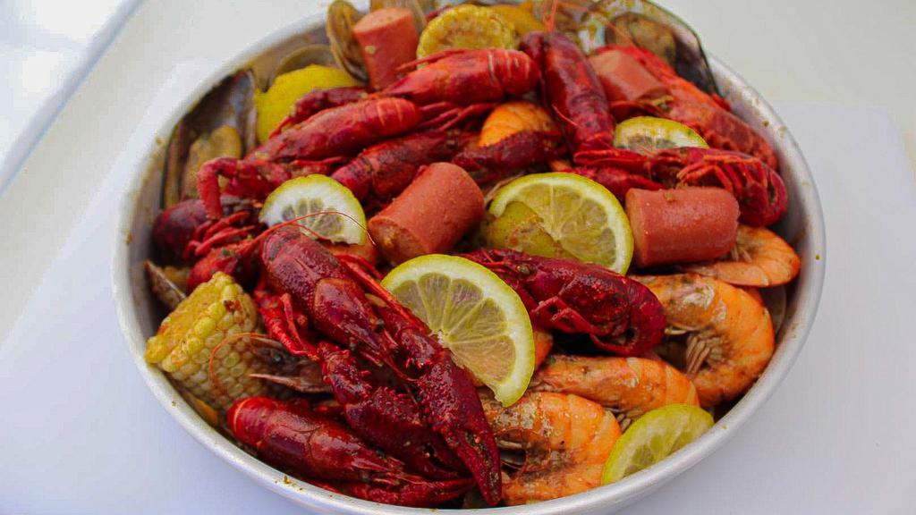 Combo #2 Mix & Match 4 pounds of any 4 Seafood Boil items · Pick 4 pounds in total  from  Shrimp, mussels, clam or  crawfish, one pond for each item.  Mix & Match. 
2 Corns,
2 Potatoes,
2 pieces of Sausages