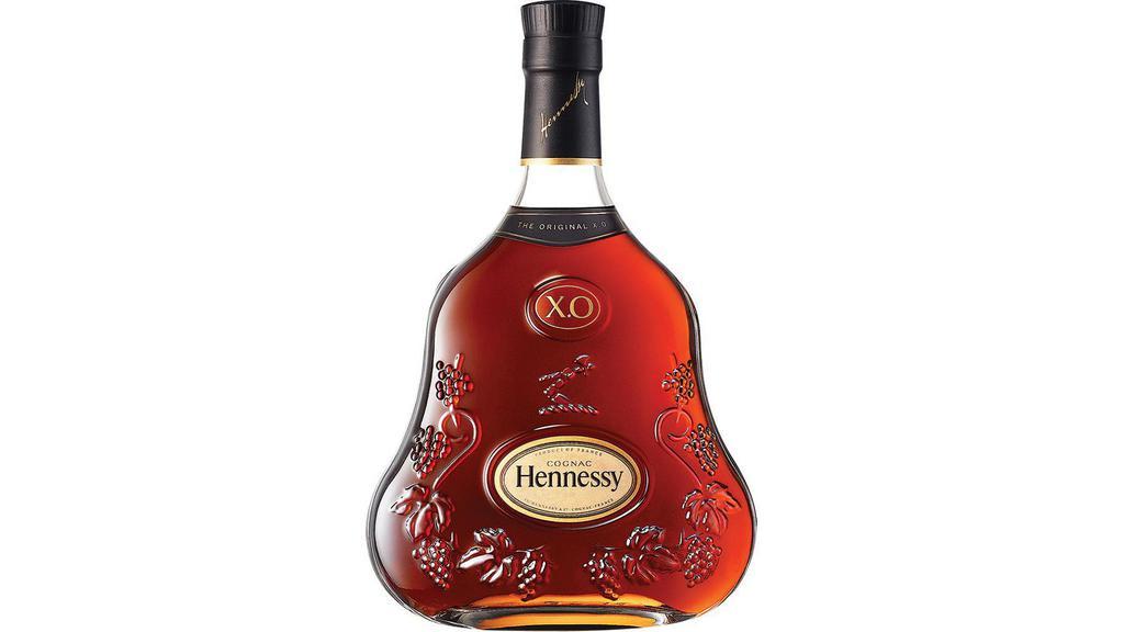 Hennessy Xo (750 Ml) · In 1870, Maurice Hennessy created Hennessy X.O for his circle of friends and introduced a new style of cognac.  Hennessy X.O is the Original, the emblematic icon of the Hennessy Maison. Deep and powerful, the eaux-de-vie of this Hennessy X.O cognac are aged in young barrels and marked out by their power and energy, but also by their capacity to achieve a great roundness through time