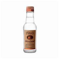 Tito's Handmade Vodka | 200ml · Distilled & bottled by Fifth generation, Inc. Austin TX. 40% alc./vol. Award winning America...