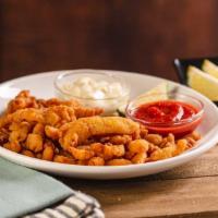 Clam Strips · Deep fried clams served served with a side of tartar and cocktail sauce. High source of prot...
