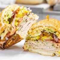 Sanfranpsycho Sandwich · Honey turkey, gouda, bacon, pesto, garlic spread and remoulade.