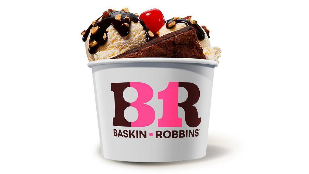 Brownie Sundae · Top off a brownie with two of your favorite ice cream flavors, hot fudge, chopped almonds, and a cherry.