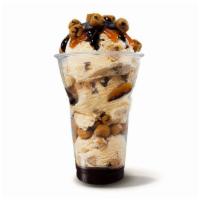 Chocolate Chip Cookie Dough Layered Sundae · Three scoops of Chocolate Chip Cookie Dough ice cream with layers of hot fudge and cookie do...