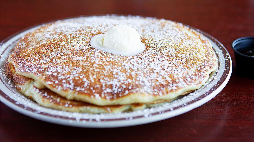 Short Stack Pancakes · 2 pieces. Topped with powdered sugar. Sweet cream buttermilk pancakes.