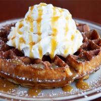 Churro Waffle · Topped with cinnamon, powdered sugar, cajeta caramel. Served with a scoop of vanilla bean ic...