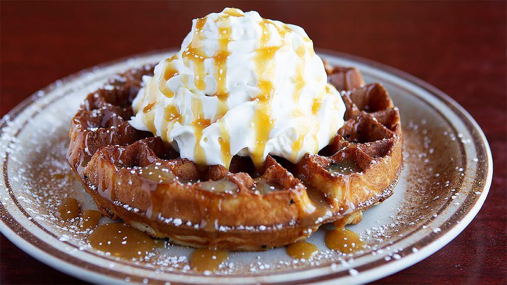 Churro Waffle · Topped with cinnamon, powdered sugar, cajeta caramel. Served with a scoop of vanilla bean ice cream.  Batter made in house every day.