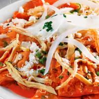 Chilaquiles · Strips of fried Corn Tortillas simmered in Salsa, topped with Eggs, Cheese, Onions,
& Cilant...
