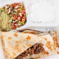 Super Quesadilla · Choice of Meat with Melted Cheese, served with Sour Cream, Guacamole & Lettuce